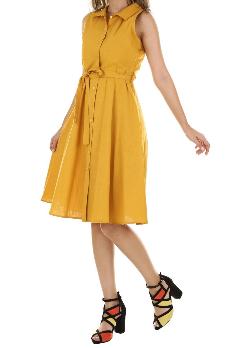 A yellow belted shirt dress with a full skirt